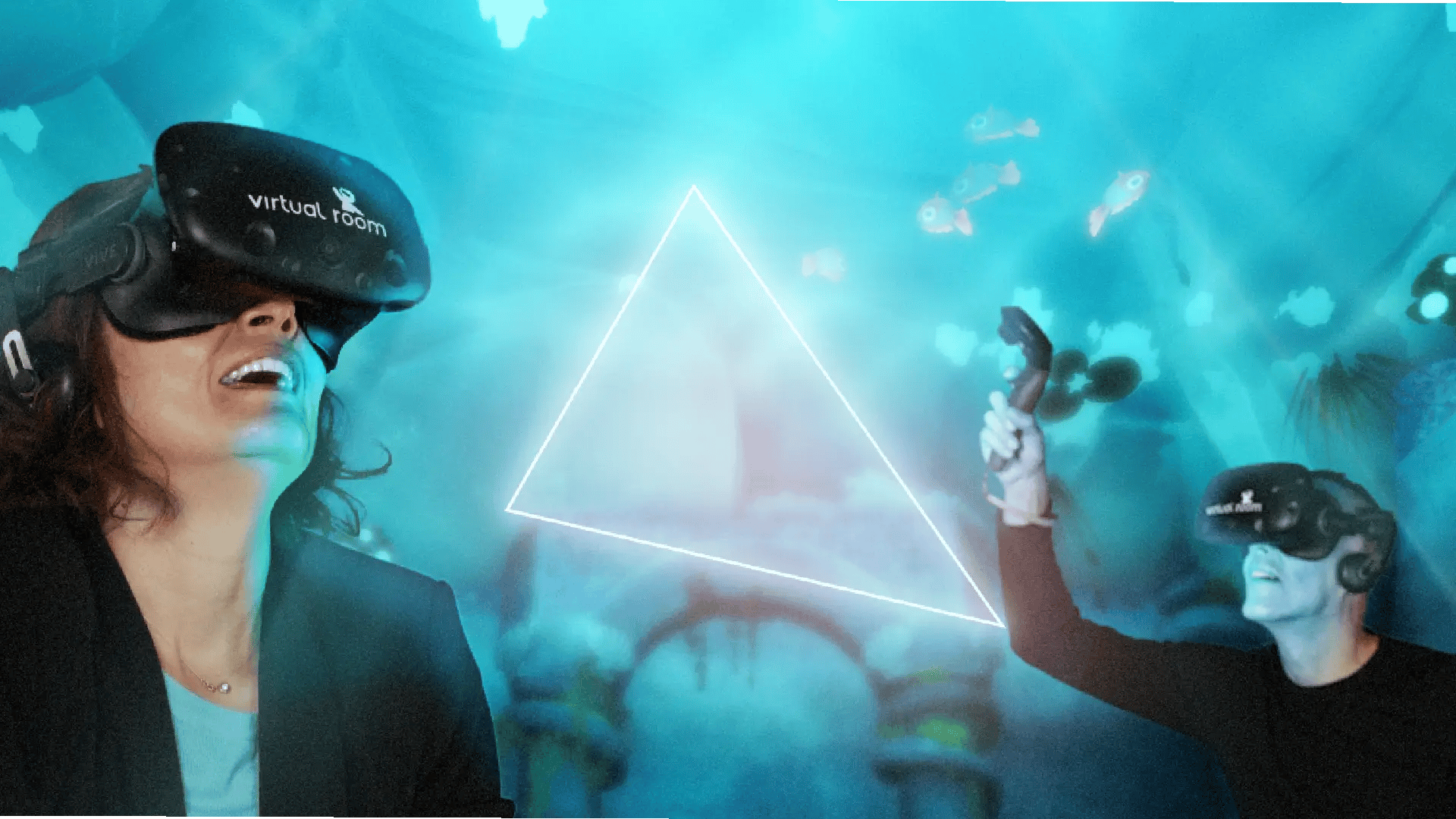 Couple enjoying an immersive underwater virtual reality adventure together, wearing VR headsets and controllers.