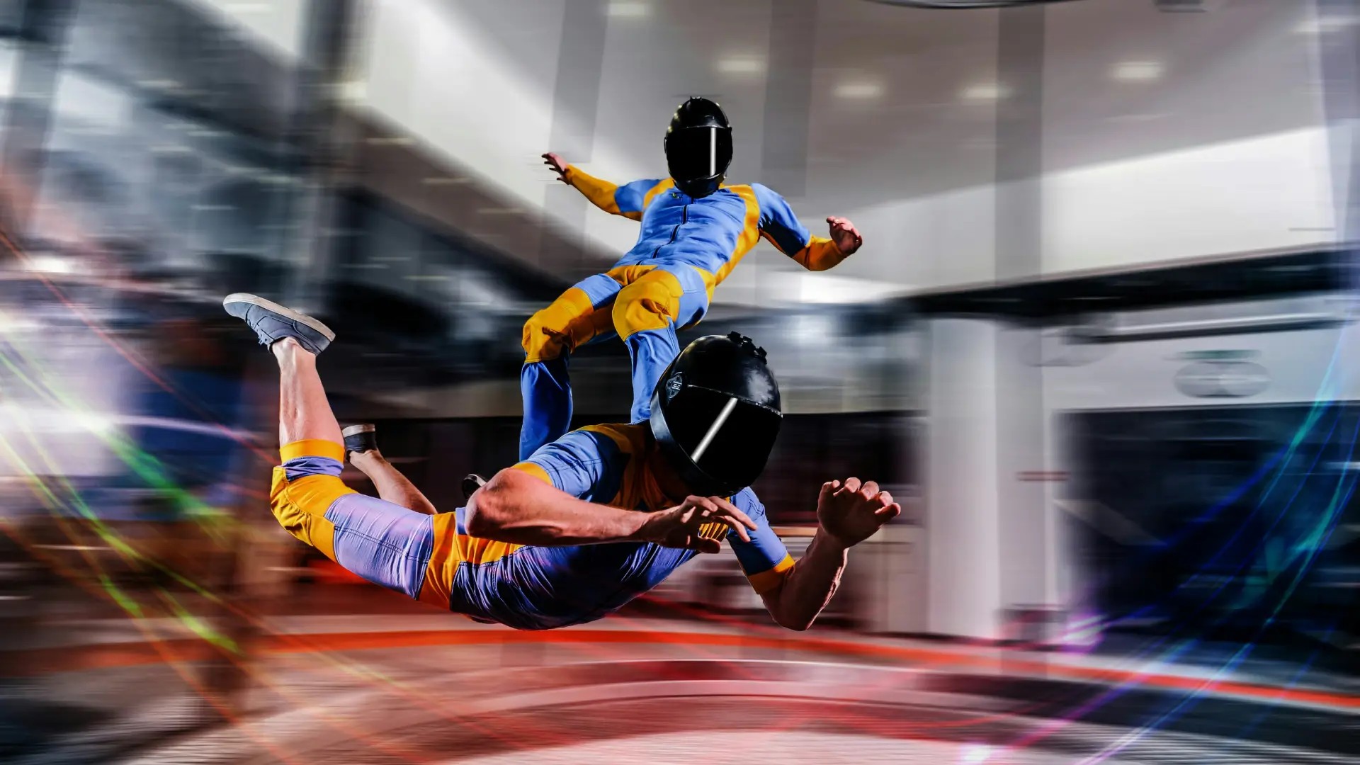 Participant enjoying indoor skydiving at iFly Singapore, experiencing the thrill of freefall in a vertical wind tunnel.