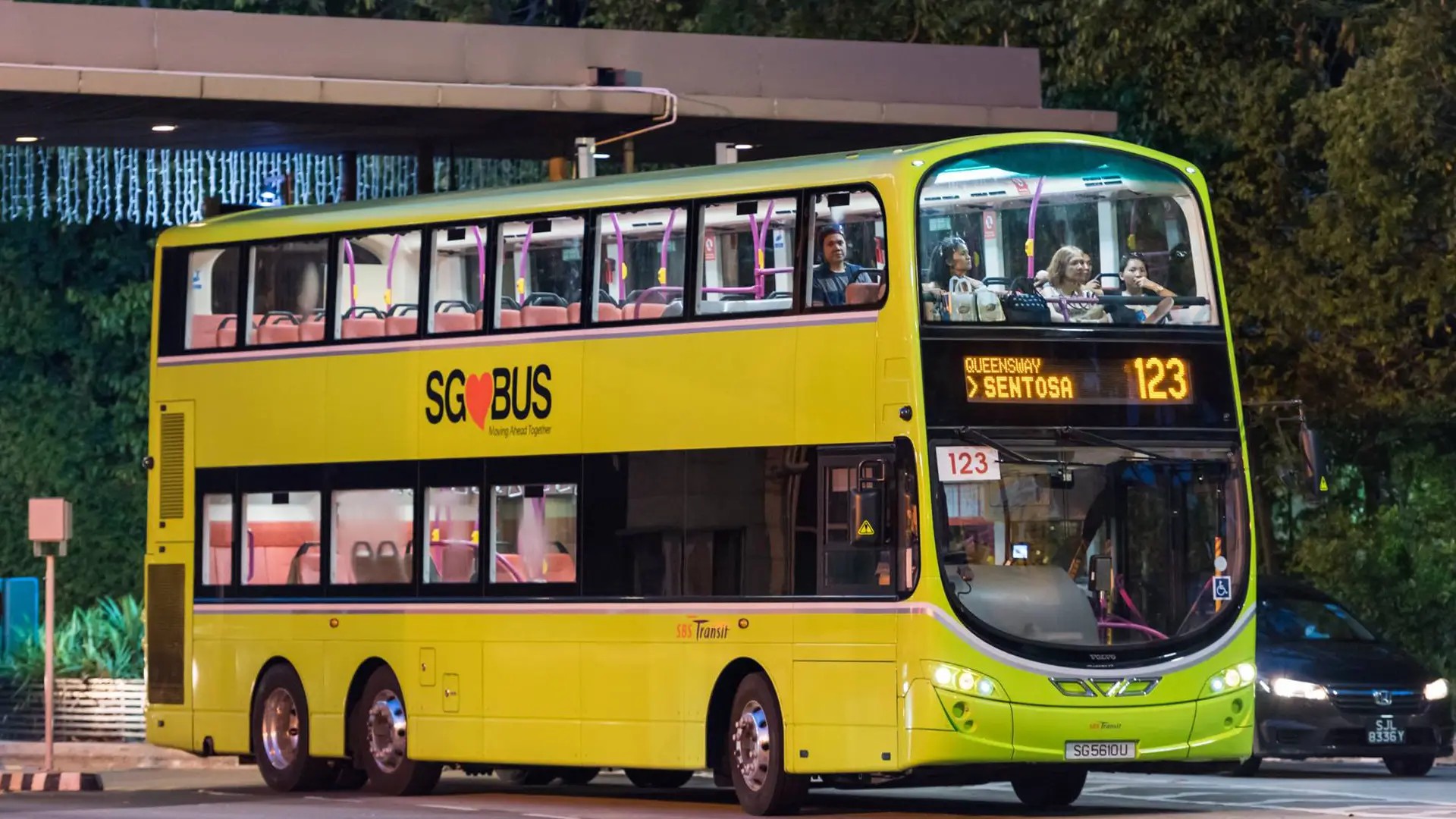 Double-decker Bus 123 travelling from central Singapore to Sentosa Island, an affordable public transport option for visitors