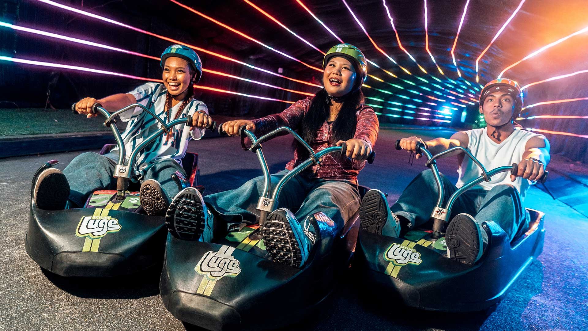 Skyline Luge Singapore A group of youths riding Luge Carts together