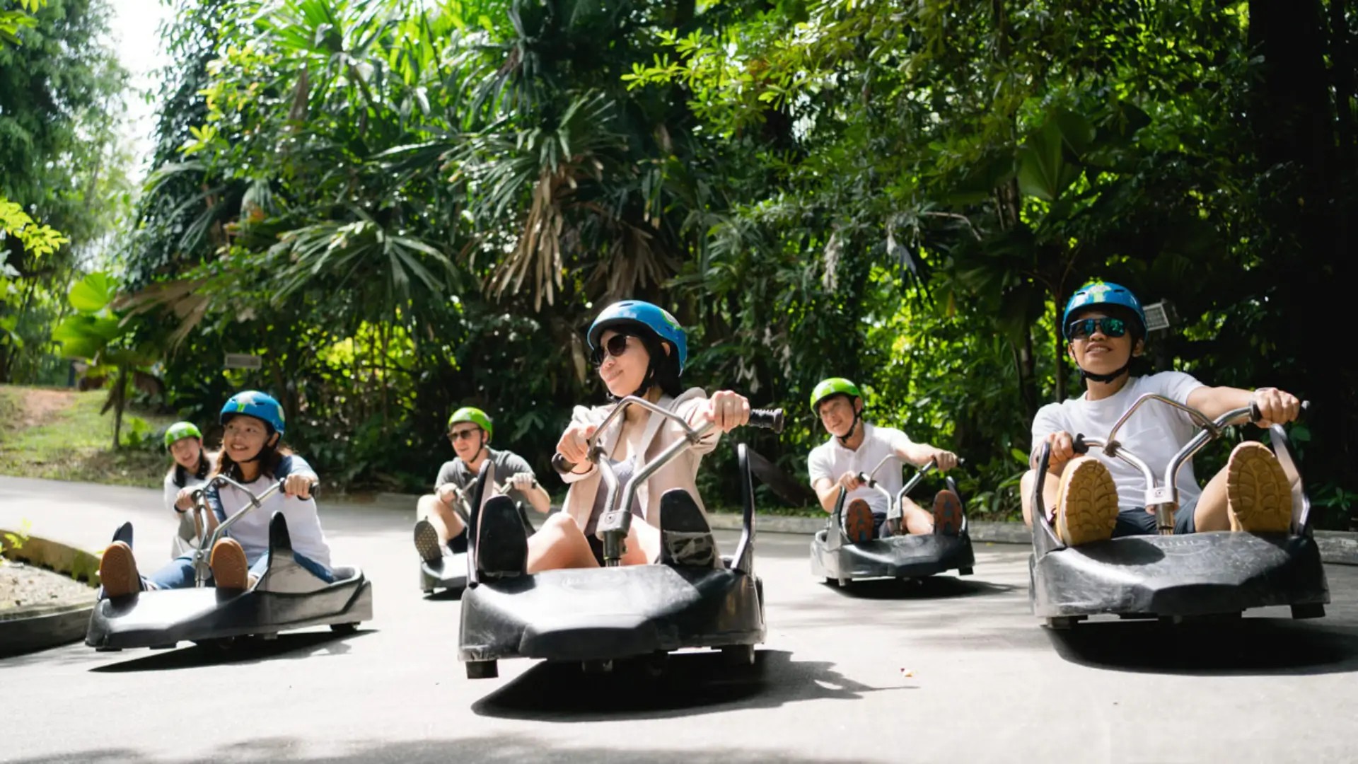 Group of riders enjoying the Skyline Luge experience in Singapore