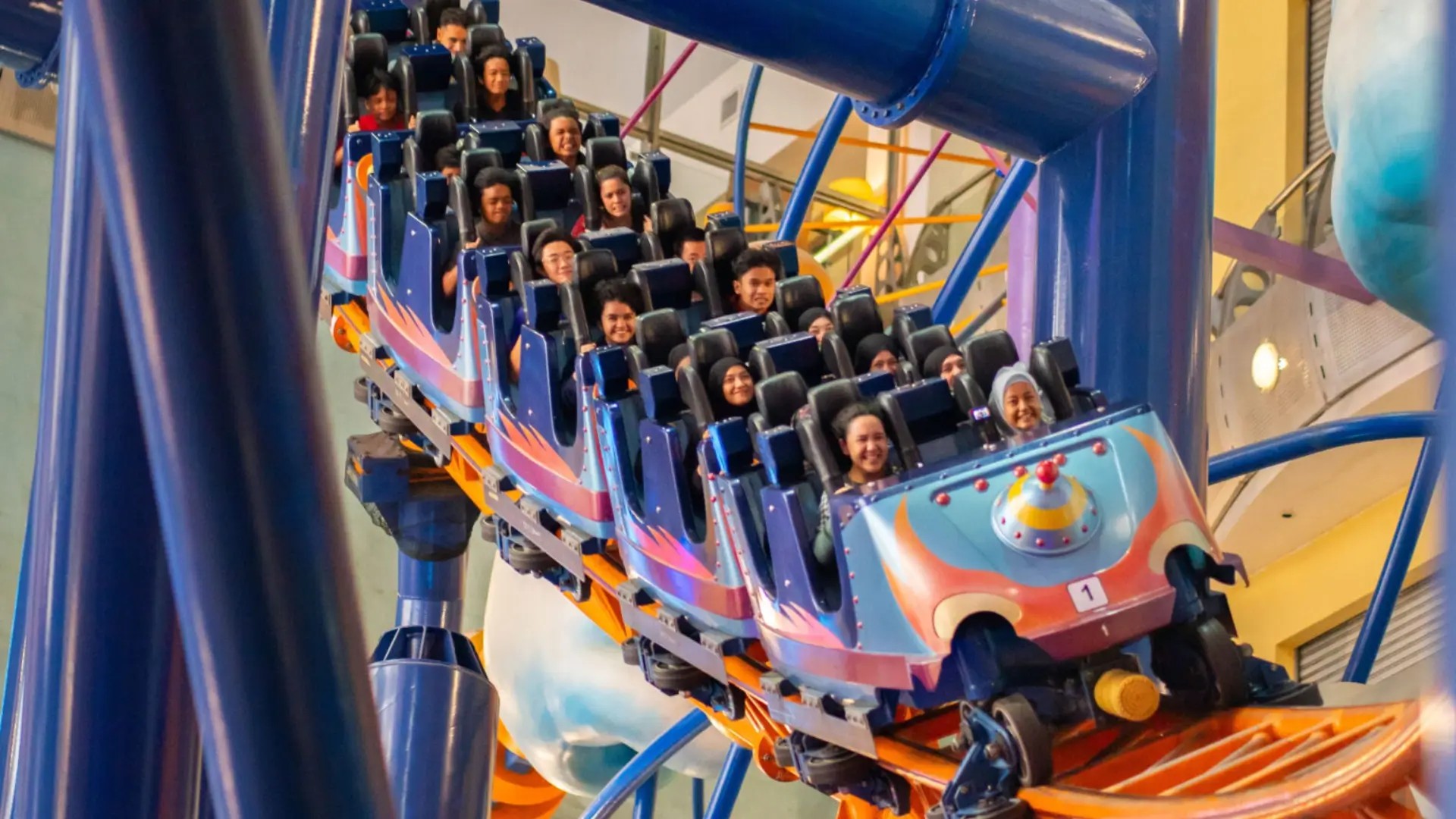 Visitors riding the Supersonic Odyssey indoor rollercoaster at Berjaya Times Square Theme Park in Kuala Lumpur